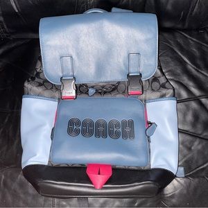 •women’s blue & black COACH book bag.